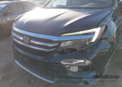 2017 Honda Pilot Touring z USA, uszkodzony, nr VIN 5FNYF5H99HB034243